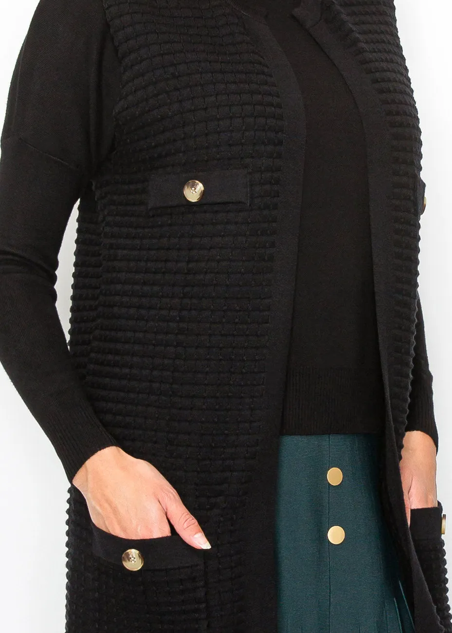 Schwarze Strickweste mit Goldknopf-Details