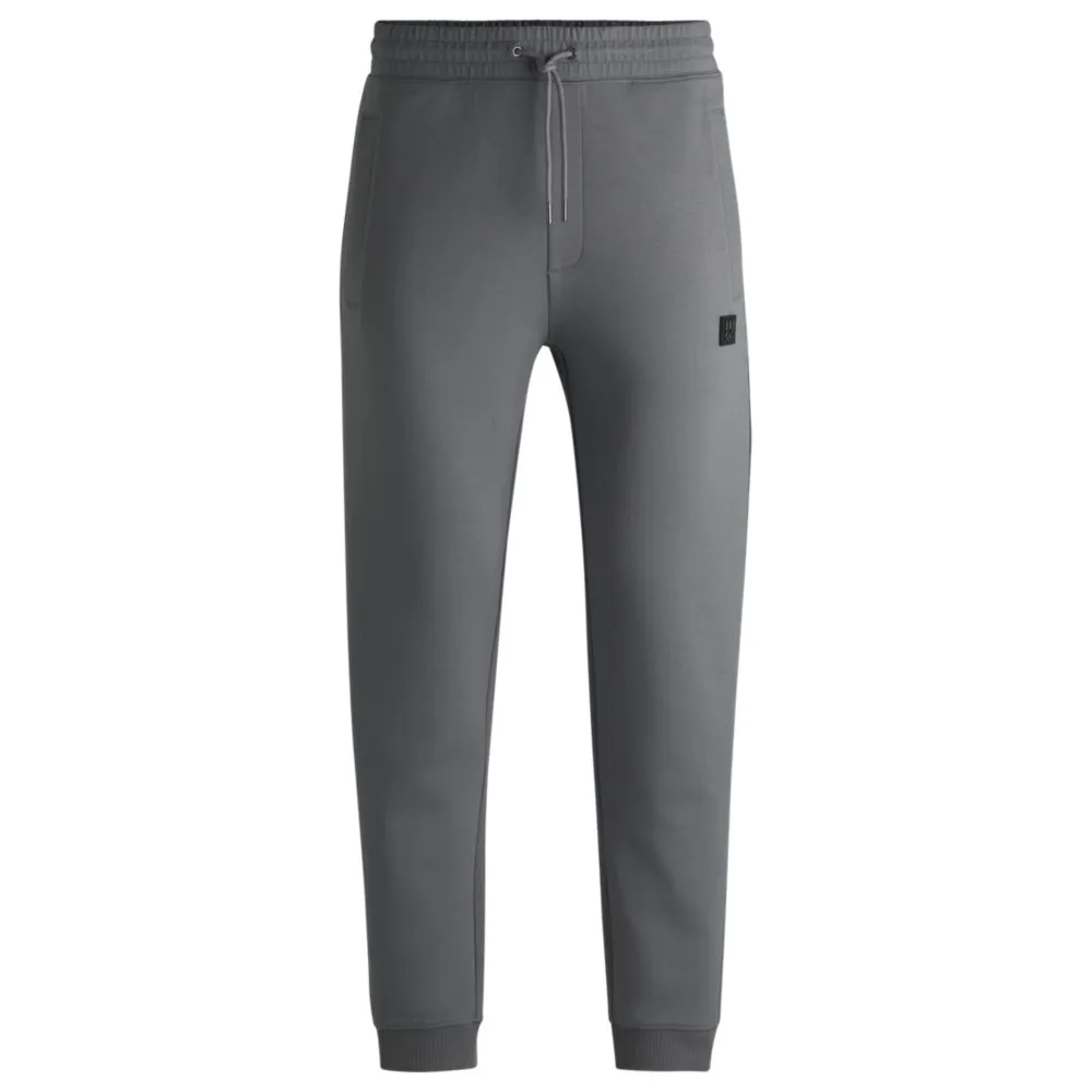 Baumwoll-Jogginghose mit gestapeltem Logo