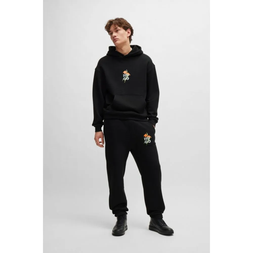Bequeme Jogginghose mit floralem Logo-Design
